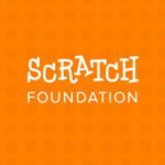 Scratch visual programming environment showing colorful coding blocks on screen
